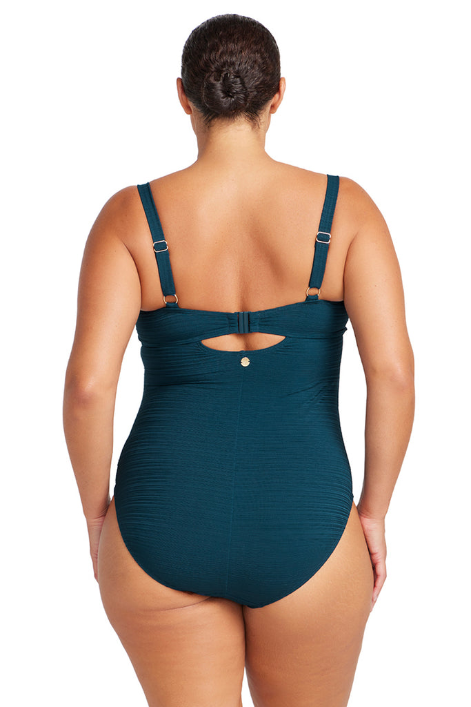 Navy swimsuit with cut-out design on a white background